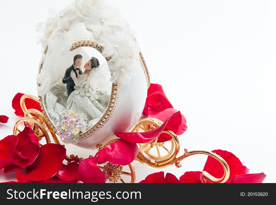 The wedding couple in a carriage. isolated background