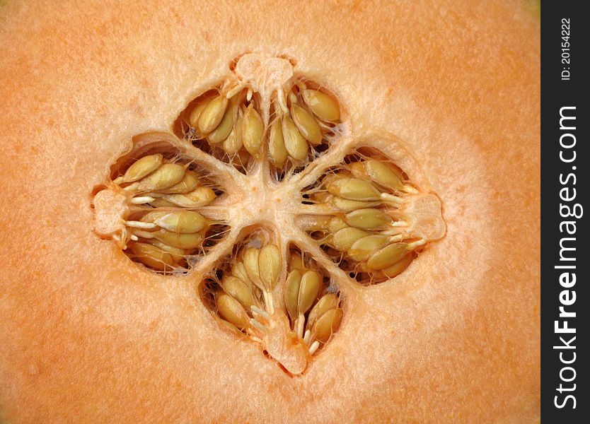 Cantaloupe cut in half with seeds exposed