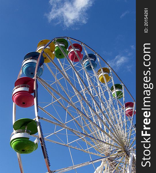 Ferris wheel at a fair on s bright sunny day