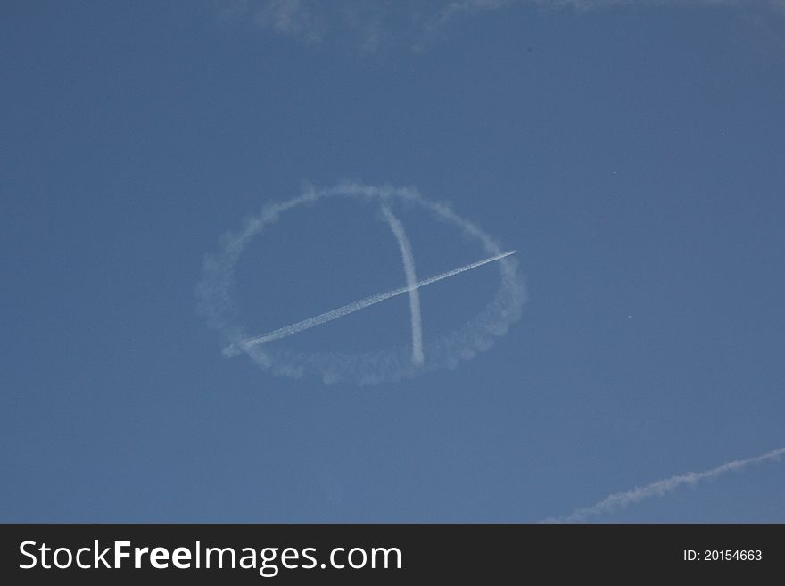 Peace sign made my a plane in the sky. Peace sign made my a plane in the sky