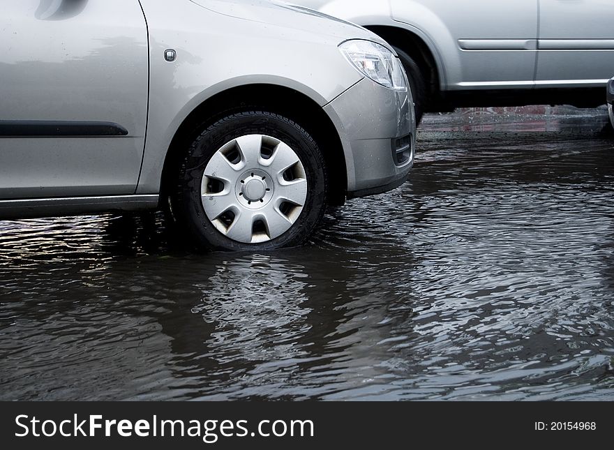 Car wheel in flood