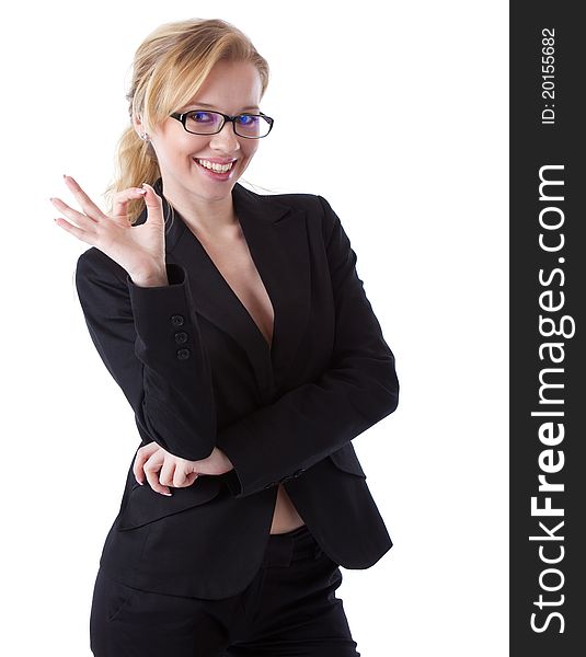 A smiling businesswoman in showing OK. isolated on a white background