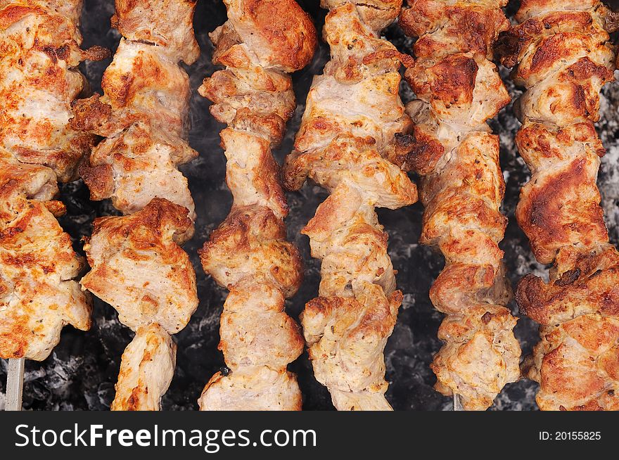 Pieces of ready meat on barbecue