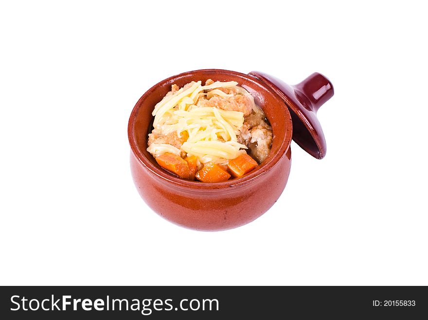 Chicken in a clay pot with vegetables and cheese. background. Chicken in a clay pot with vegetables and cheese. background.