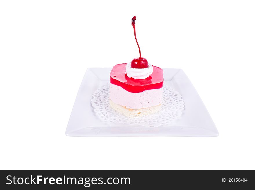 Cake with cherry jam, jelly on a plate. Shallow depth of field. Cake with cherry jam, jelly on a plate. Shallow depth of field.