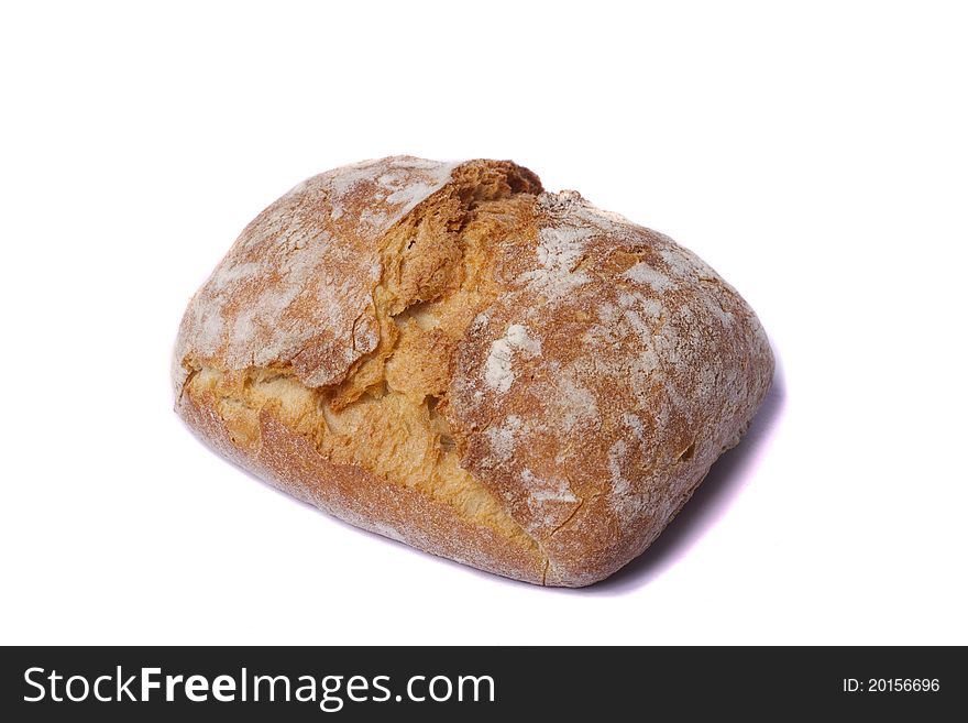 Close view of some bread  isolated on a white background. Close view of some bread  isolated on a white background.