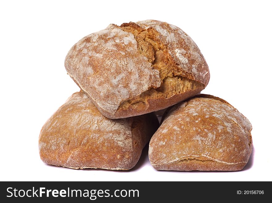Close view of some bread isolated on a white background.