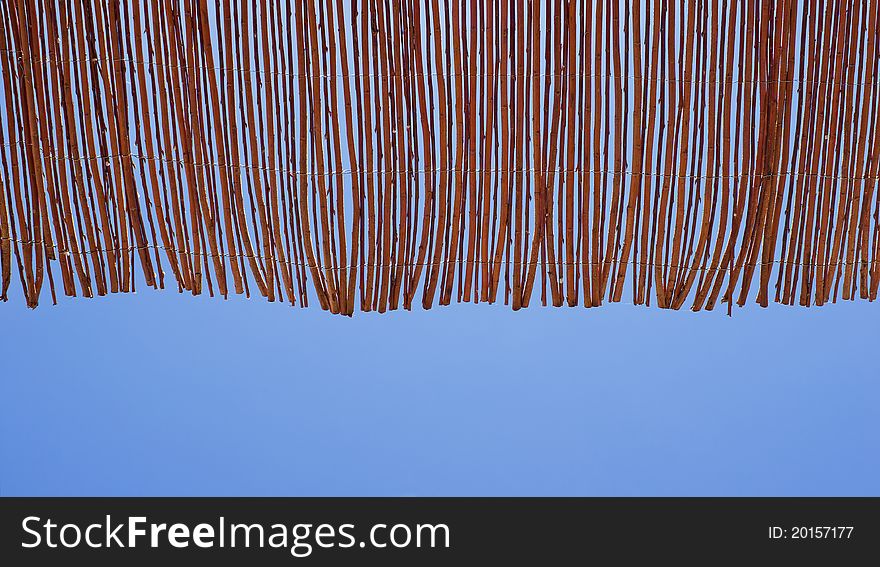 Sitting under a reed roof in tropical holidays. Sitting under a reed roof in tropical holidays