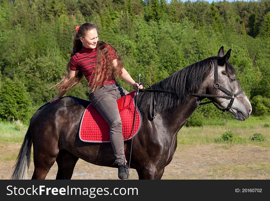 Beautiful Girl On Black Horse