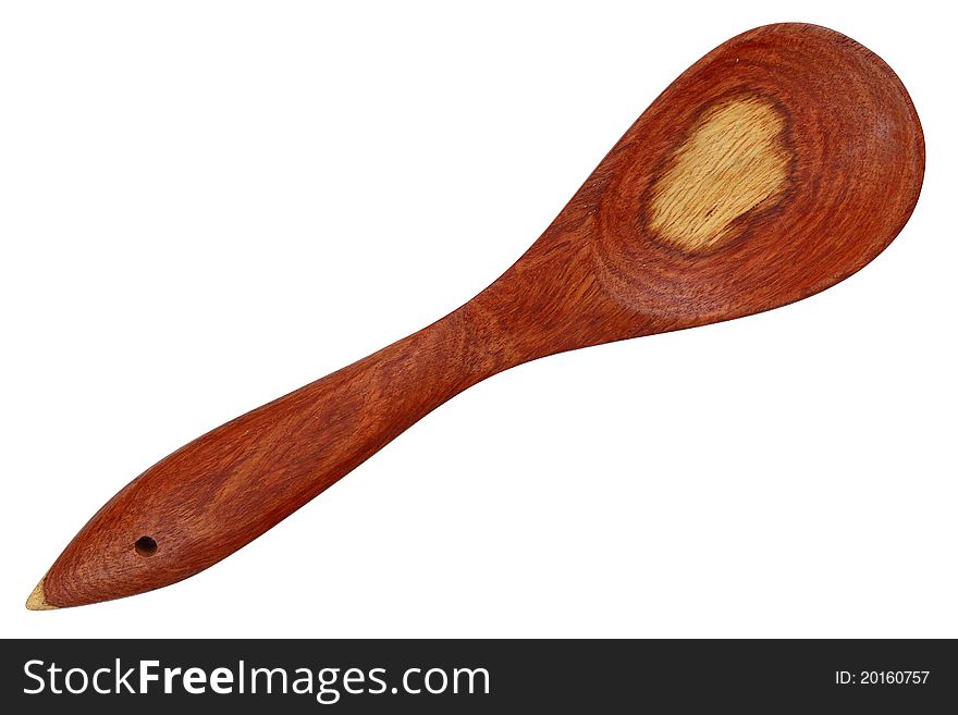 The ladle fetches rice from the wood and white background