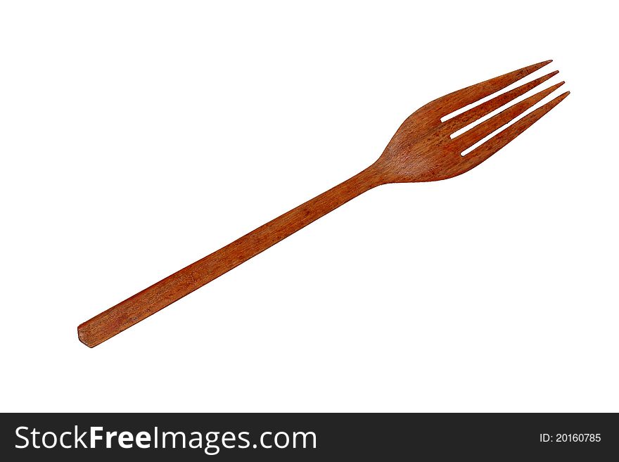 A fork produces from the wood on white background. A fork produces from the wood on white background