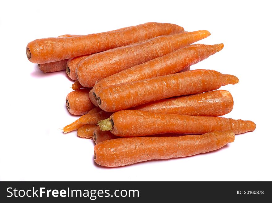 Close up view of a bunch of carrots isolated on a white background.