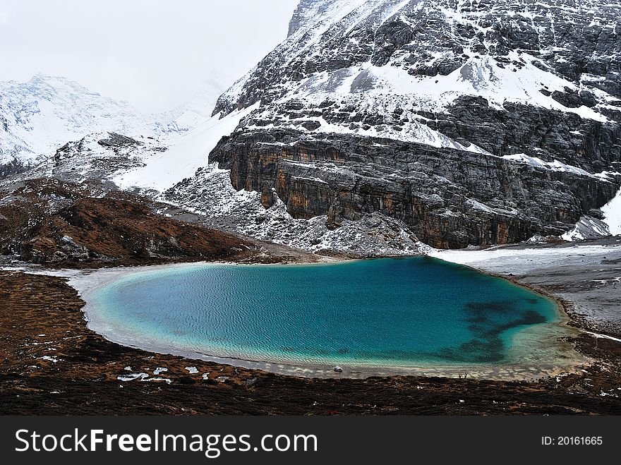 Niunaihai Lake is a glacial lake in Yading, Daocheng county, western Sichuan province, China. It is ion the plateau  surrounded by snow mountains