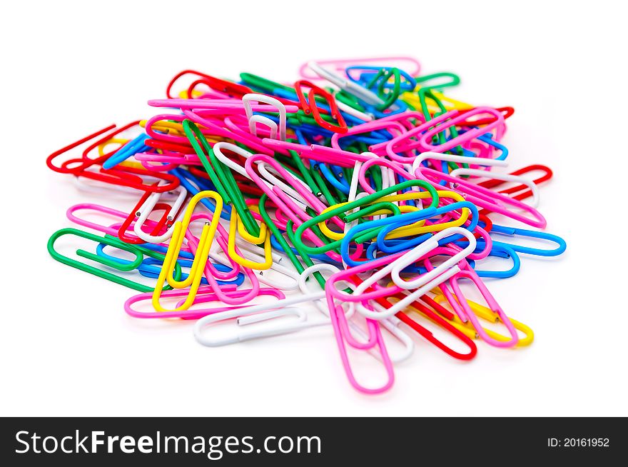 Colored paper clips. Isolated on white background