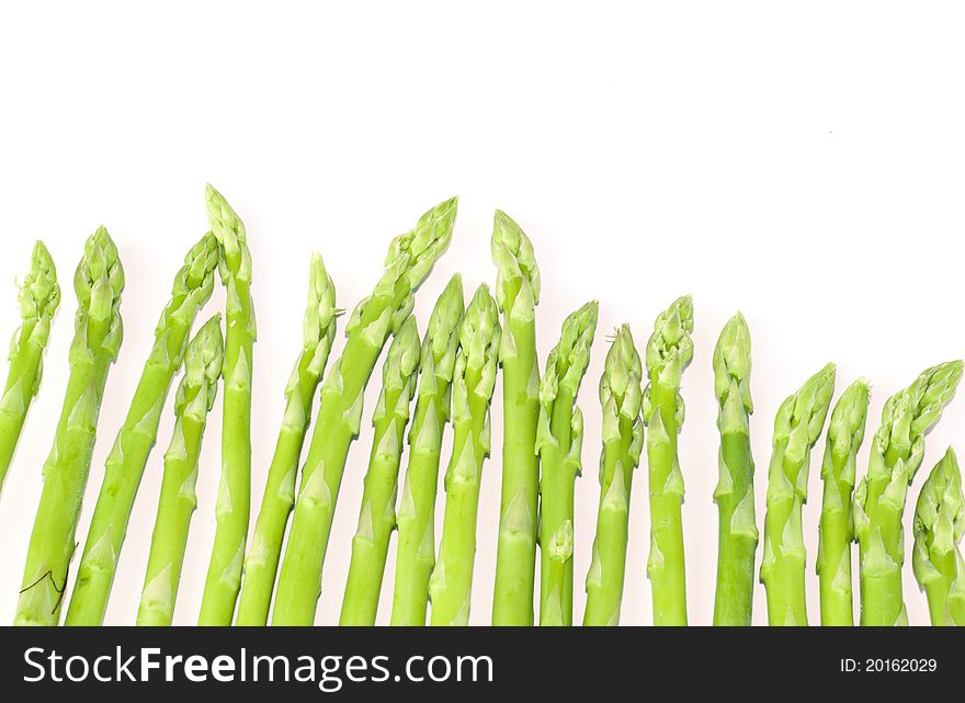 Fresh asparagus isolated on white close up