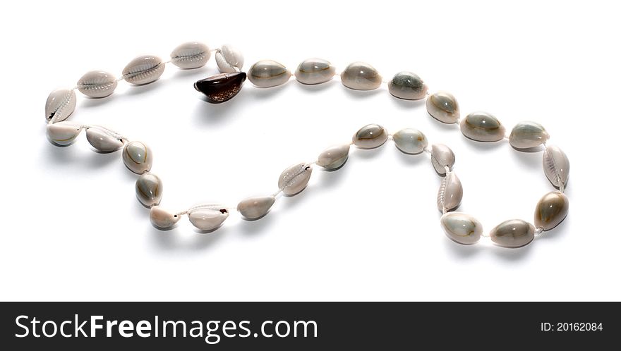 Beads made of conches isolated on white background / 11