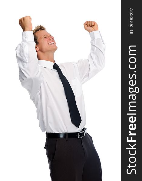 Attractive white businessman is overjoyed and raises his arms in victory; isolated on white. Attractive white businessman is overjoyed and raises his arms in victory; isolated on white