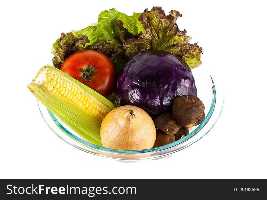 Vegetable in glass bold with white background. Vegetable in glass bold with white background