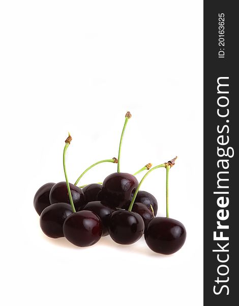 Heap of black cherries isolated