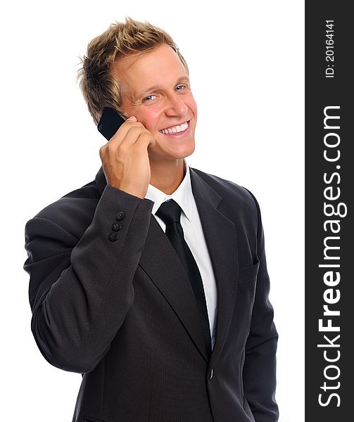 Smiling businessman on his mobile phone, communications concept. Smiling businessman on his mobile phone, communications concept