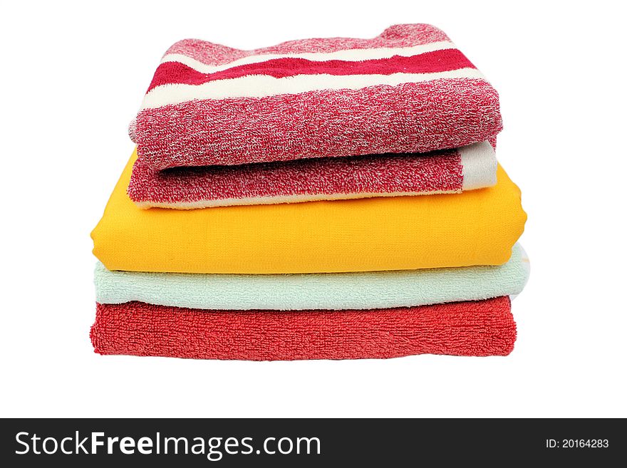 Colorful towels isolated on a white background