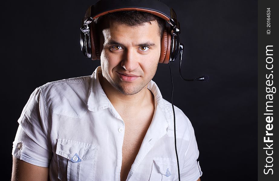 Confident man is wearing headphones. Confident man is wearing headphones