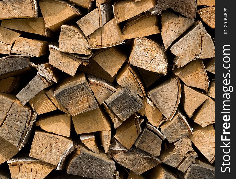 Finely cut firewood , pile of logs. Finely cut firewood , pile of logs