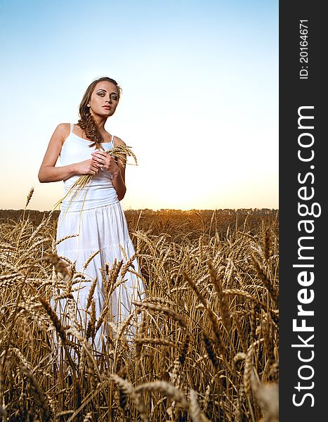 Woman in wheat field