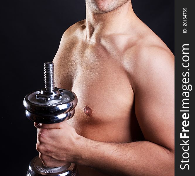 Image of sexy body and dumbbells. Image of sexy body and dumbbells