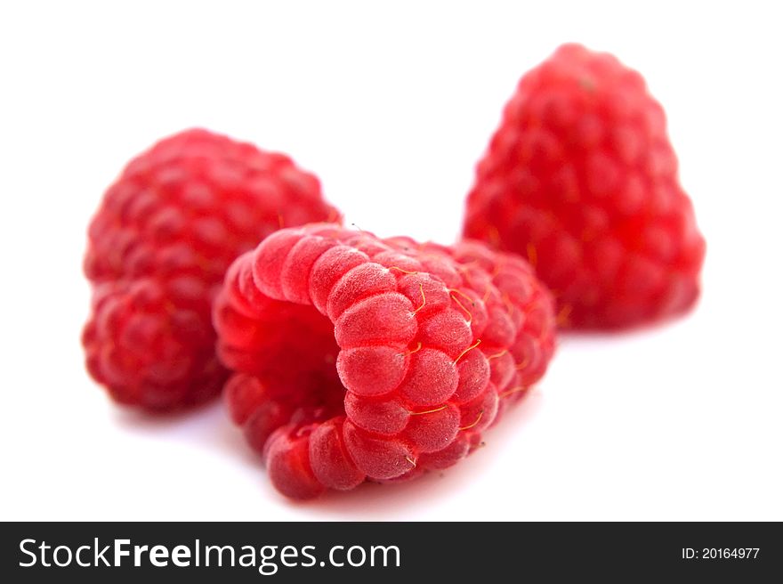 Isolated fruits raspberries on a white background. Isolated fruits raspberries on a white background