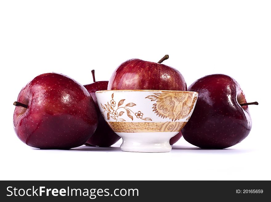 Close up view of some red apples isolated on a white background.