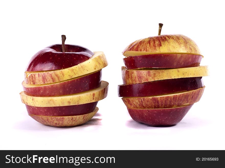 Close up view of some red apples isolated on a white background.