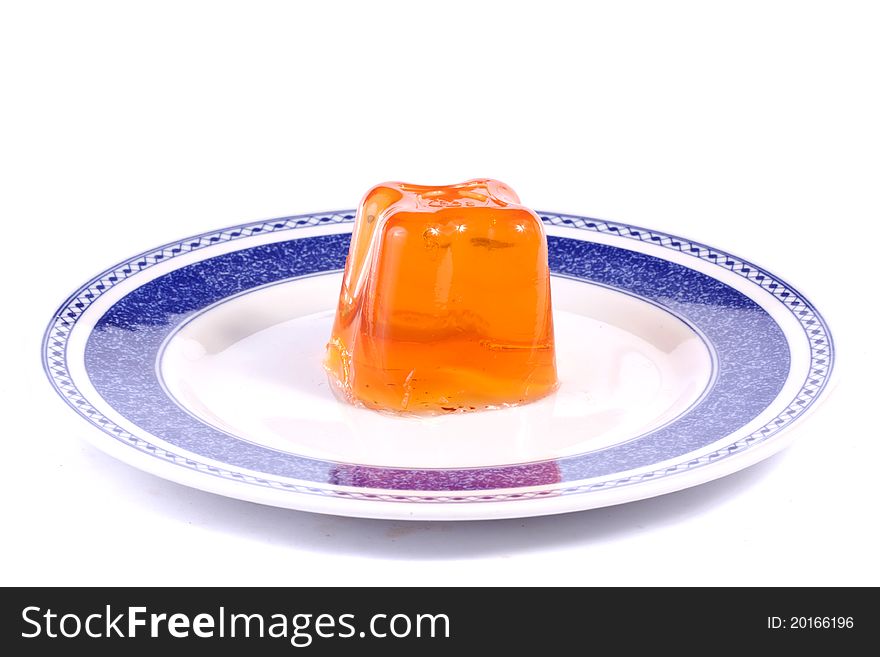 Close up view of a orange gelatin isolated on a white background.