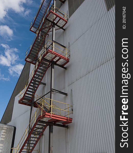 Steel staircase on the outside of an industrial building