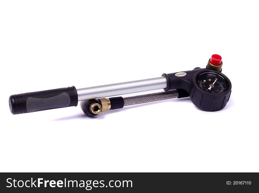 Close up view of a bicycle air pump isolated on a white background.