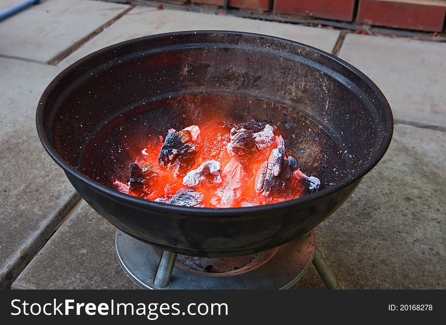 Red hot burning charcoal preparing for grilling. Red hot burning charcoal preparing for grilling