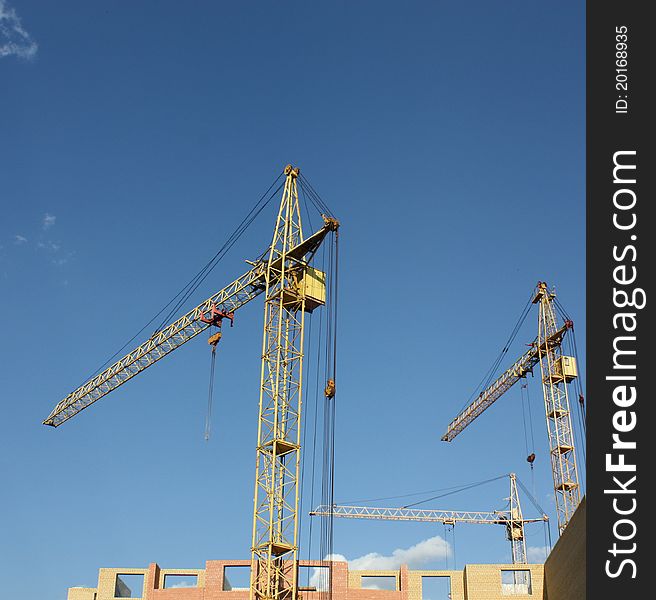 Cranes at a construction site.