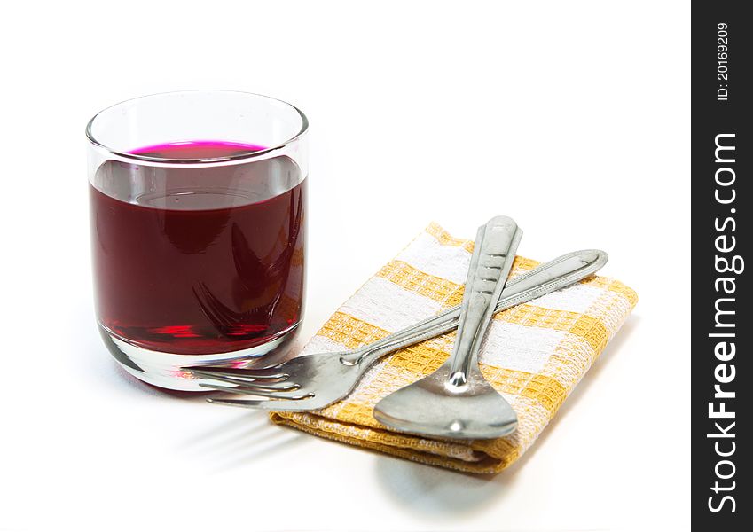 Drinking and spoon on white background