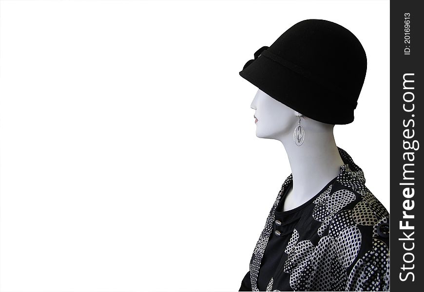 Mannequin with black hat, black and white top with space for text. Mannequin with black hat, black and white top with space for text