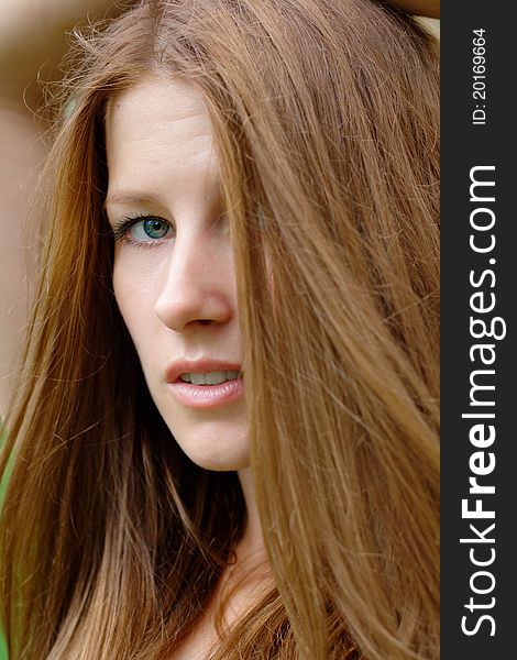 Portrait of a beautiful girl at the park