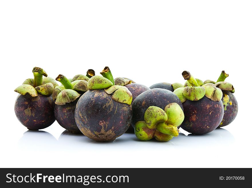 Mangosteen tropical fruit isolated on white background