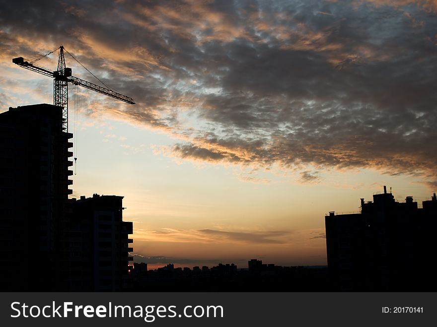 Construction site in front of beautiful sunset sky. Construction site in front of beautiful sunset sky