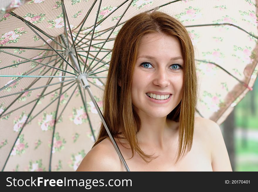 Portrait of a beautiful girl with umbrella