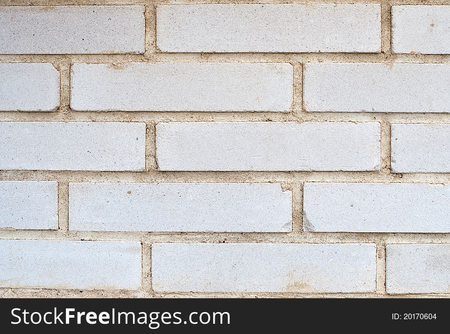 A detailed view of white brick wall.