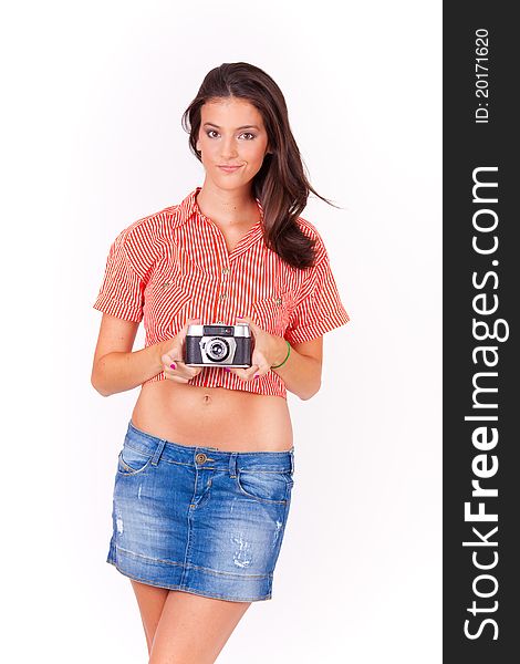 Young woman taking pictures with vintage camera on white background. Young woman taking pictures with vintage camera on white background