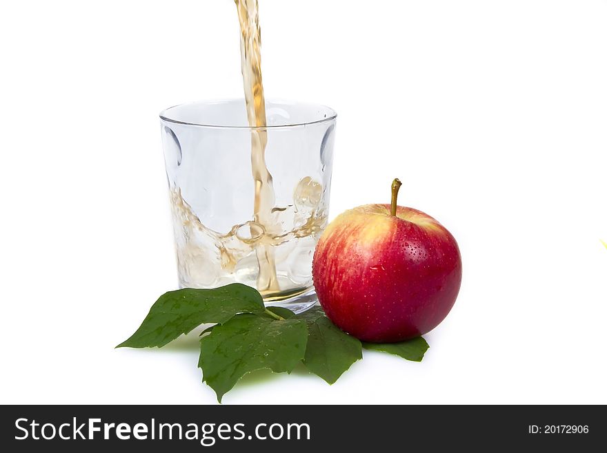 Pouring apple juice - isloated over white