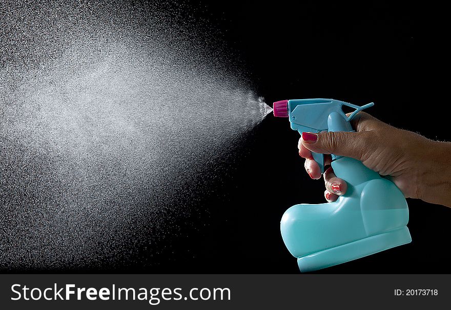 Hand that shoot water in air by spray. Hand that shoot water in air by spray