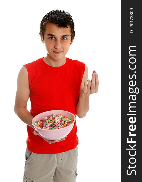 Smiling boy holding a bowl of sugar coated popcorn. White background. Smiling boy holding a bowl of sugar coated popcorn. White background.