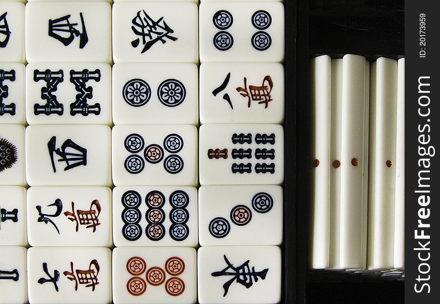 Part of a set of mah jong tiles with the holders.