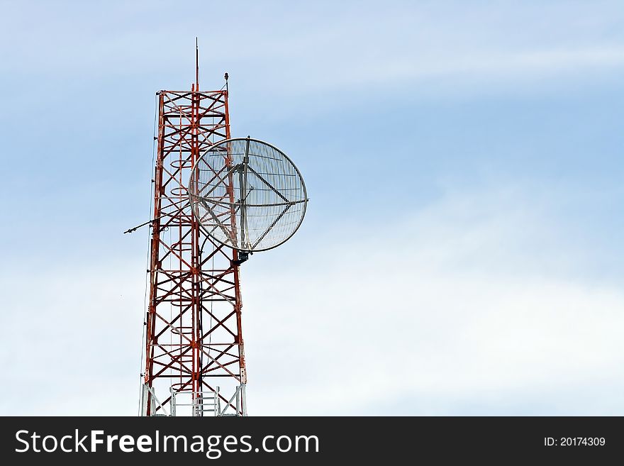 Satellite Dish on Telecommunication Radio antenna Tower with blue sky. Satellite Dish on Telecommunication Radio antenna Tower with blue sky